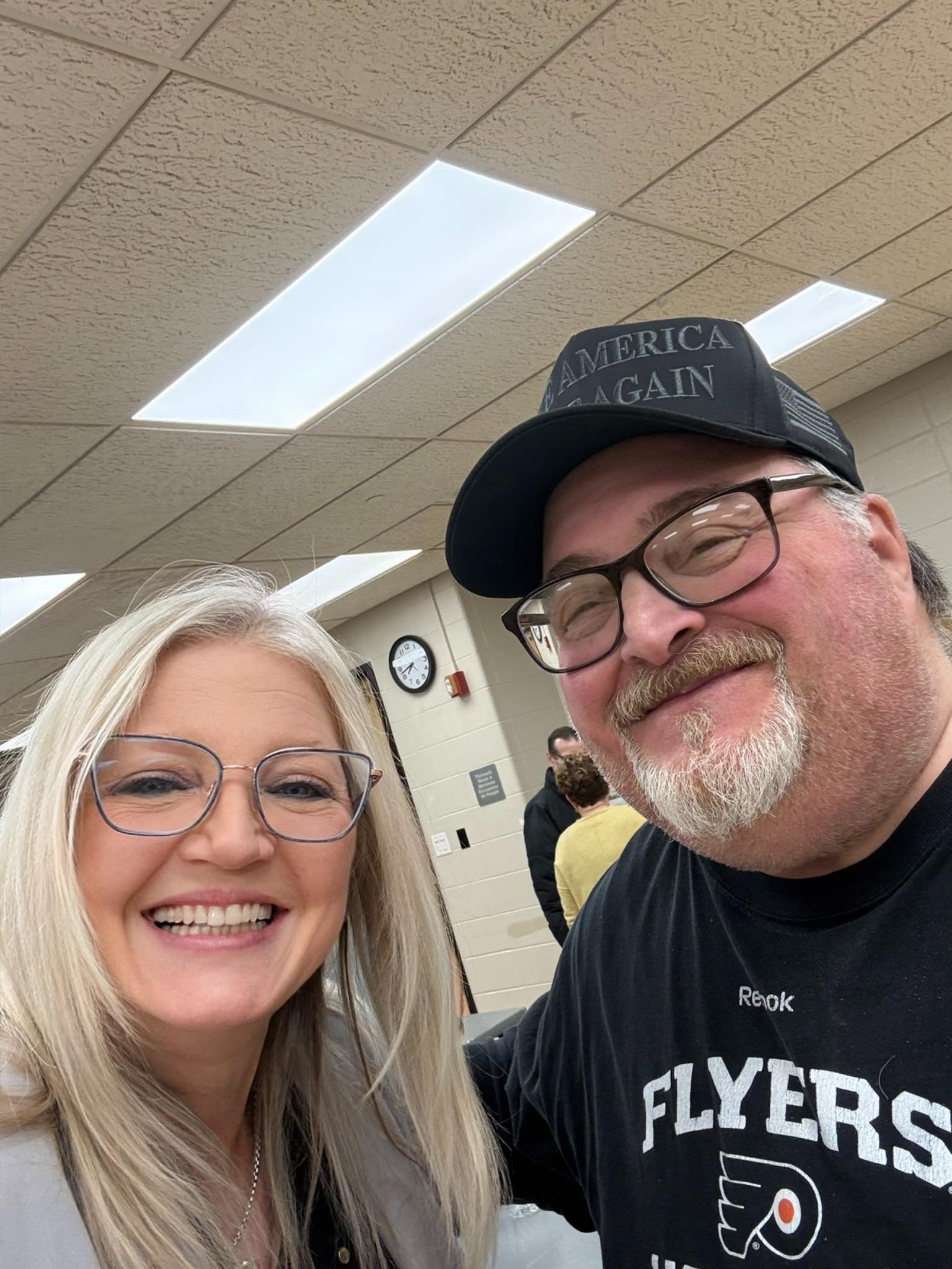 Aurora Stuski for Congress with voter and Flyer's fan at event with Scott Pressler's Early Vote Action (EVA) and Pam Propson